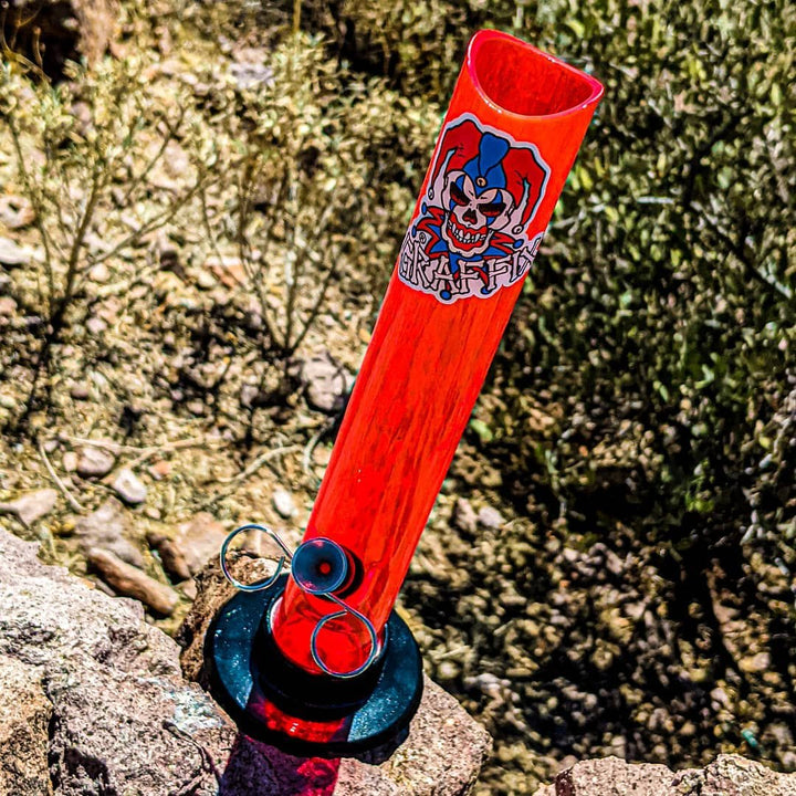Red acrylic Graffix on desert rocks